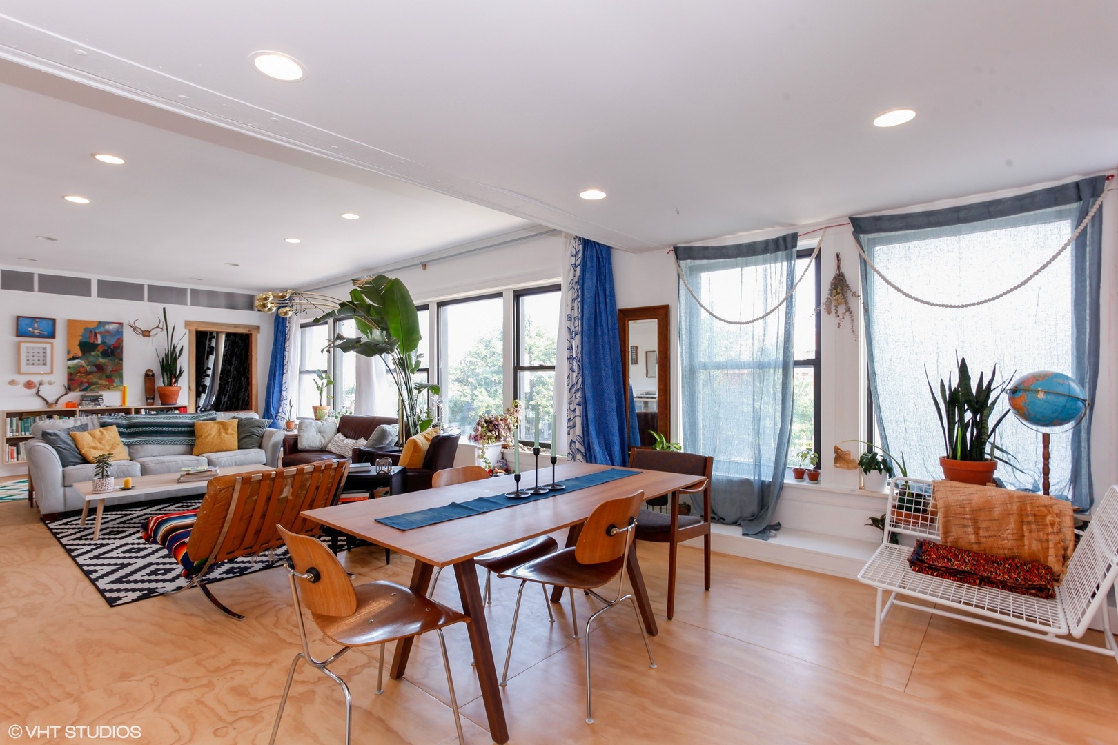4837 West Irving Park Road, Unit 2 Chicago, IL 60641 - Photo 4 of 24 a living room with furniture and a large window