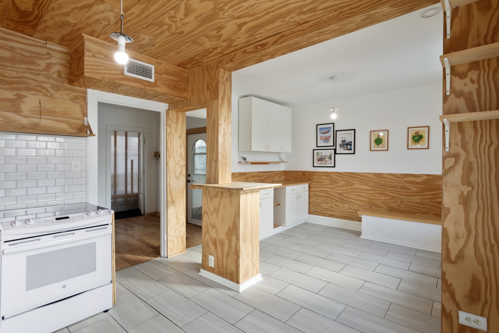 4837 West Irving Park Road, Unit 2 Chicago, IL 60641 - Photo 9 of 24 a view of a kitchen with a stove