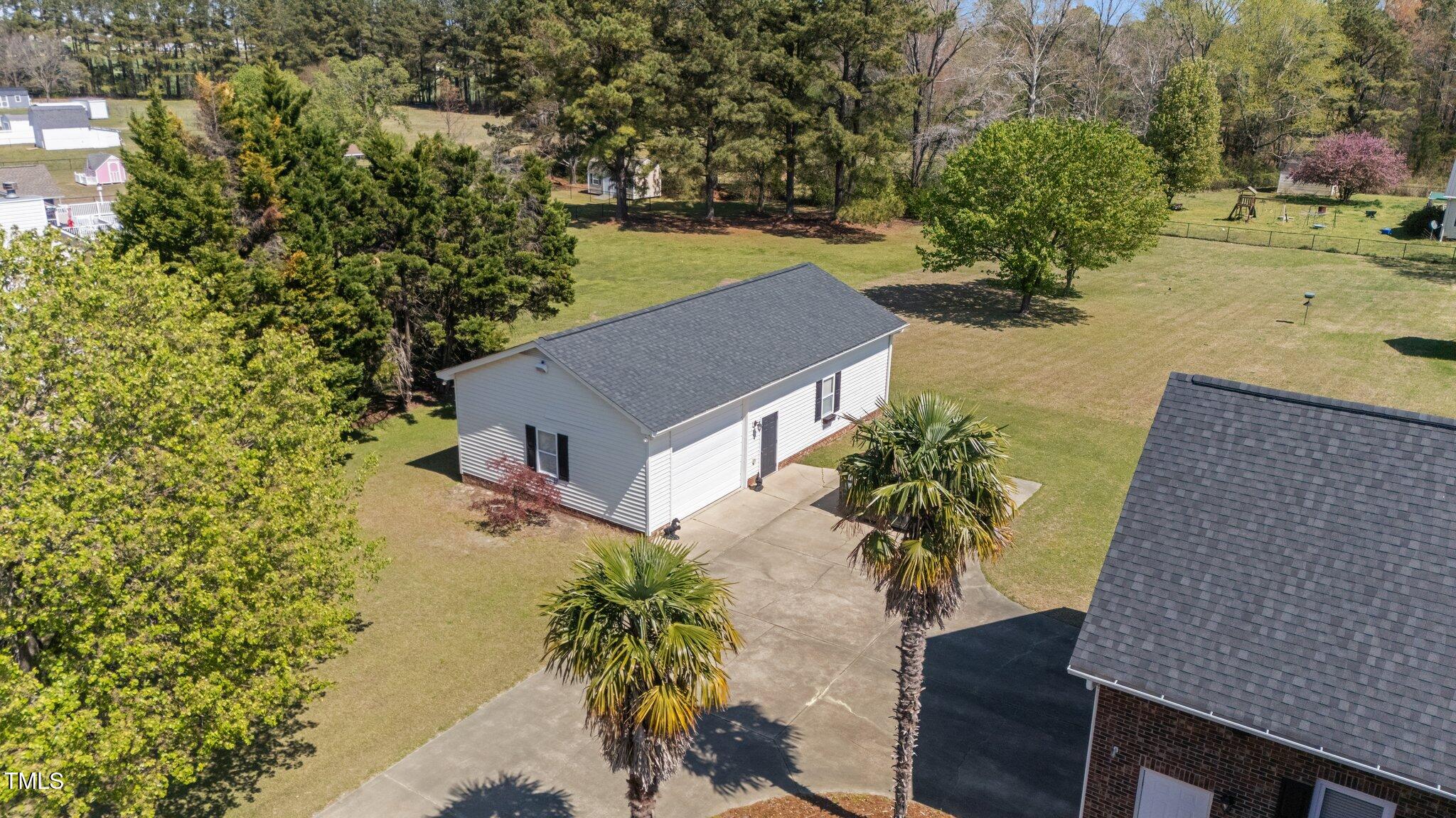 1055 Tilghman Road Dunn, NC 28334 - Photo 6 of 55 6-web-or-mls-DJI_20250327143650_0064_D