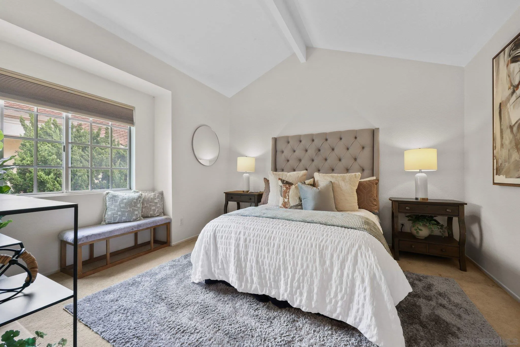 740 Breeze Hill Road, Unit 193 Vista, CA 92081 - Photo 14 of 35 a bedroom with a bed and a couch
