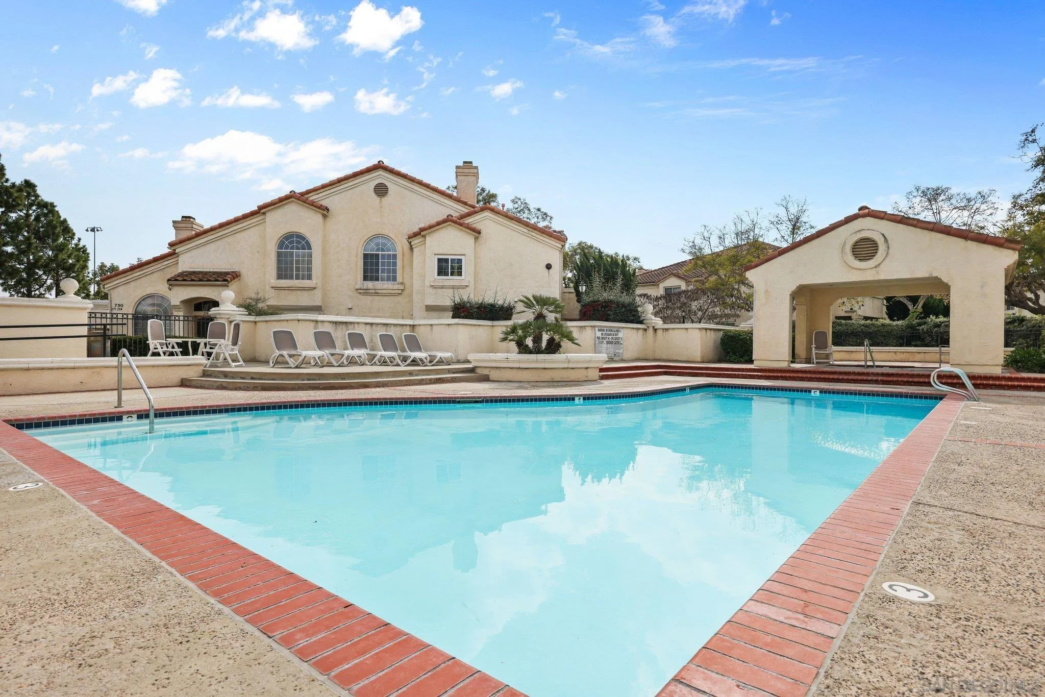740 Breeze Hill Road, Unit 193 Vista, CA 92081 - Photo 32 of 35 a view of a house with swimming pool