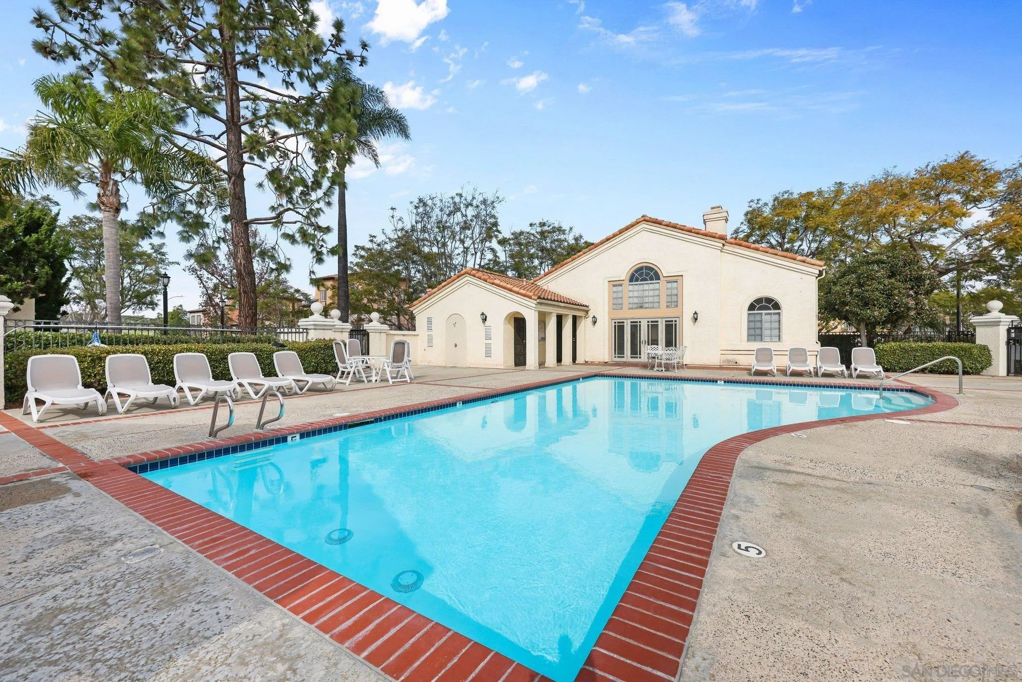 740 Breeze Hill Road, Unit 193 Vista, CA 92081 - Photo 33 of 35 a view of a house with swimming pool
