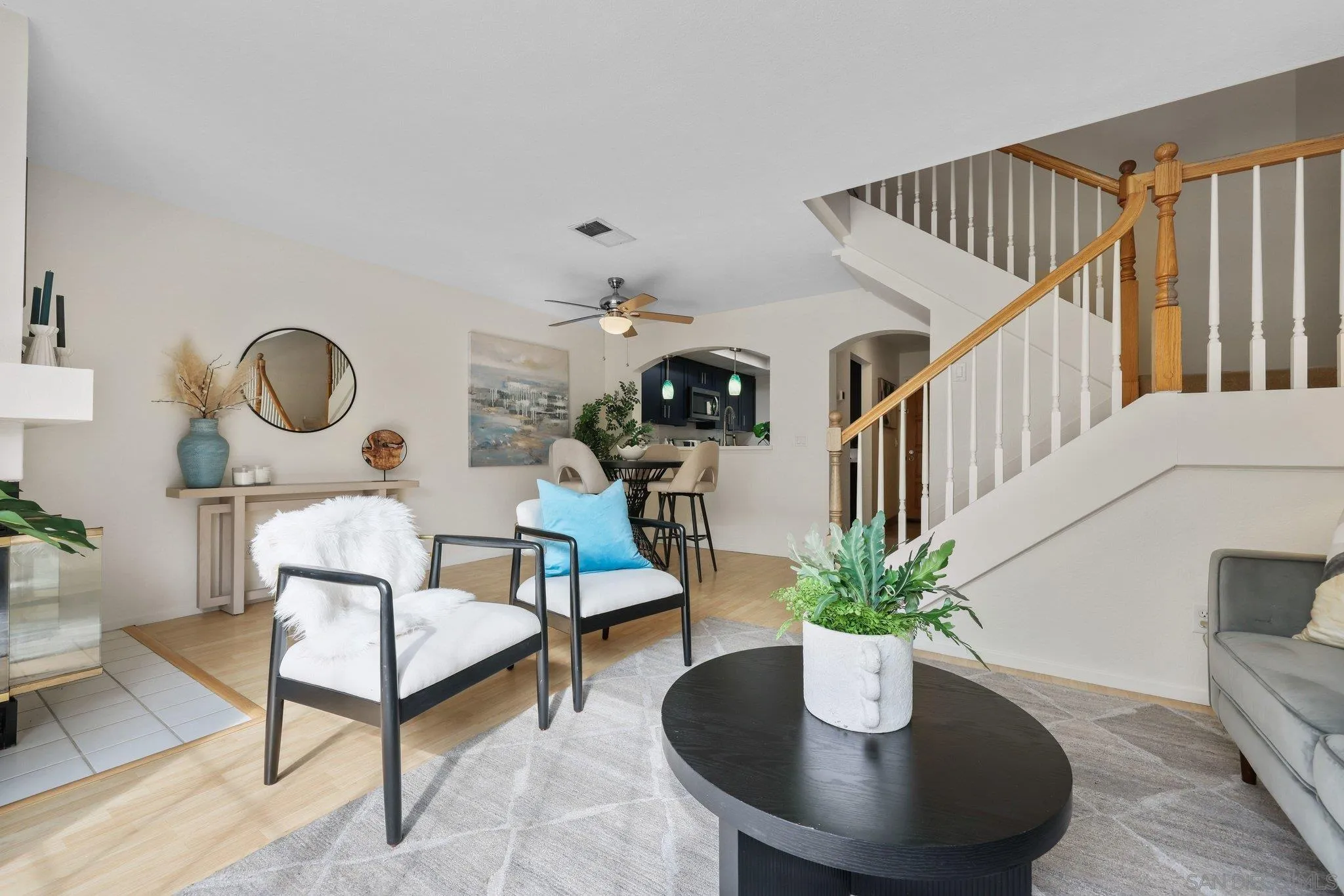 740 Breeze Hill Road, Unit 193 Vista, CA 92081 - Photo 8 of 35 a living room with furniture potted plant and a table