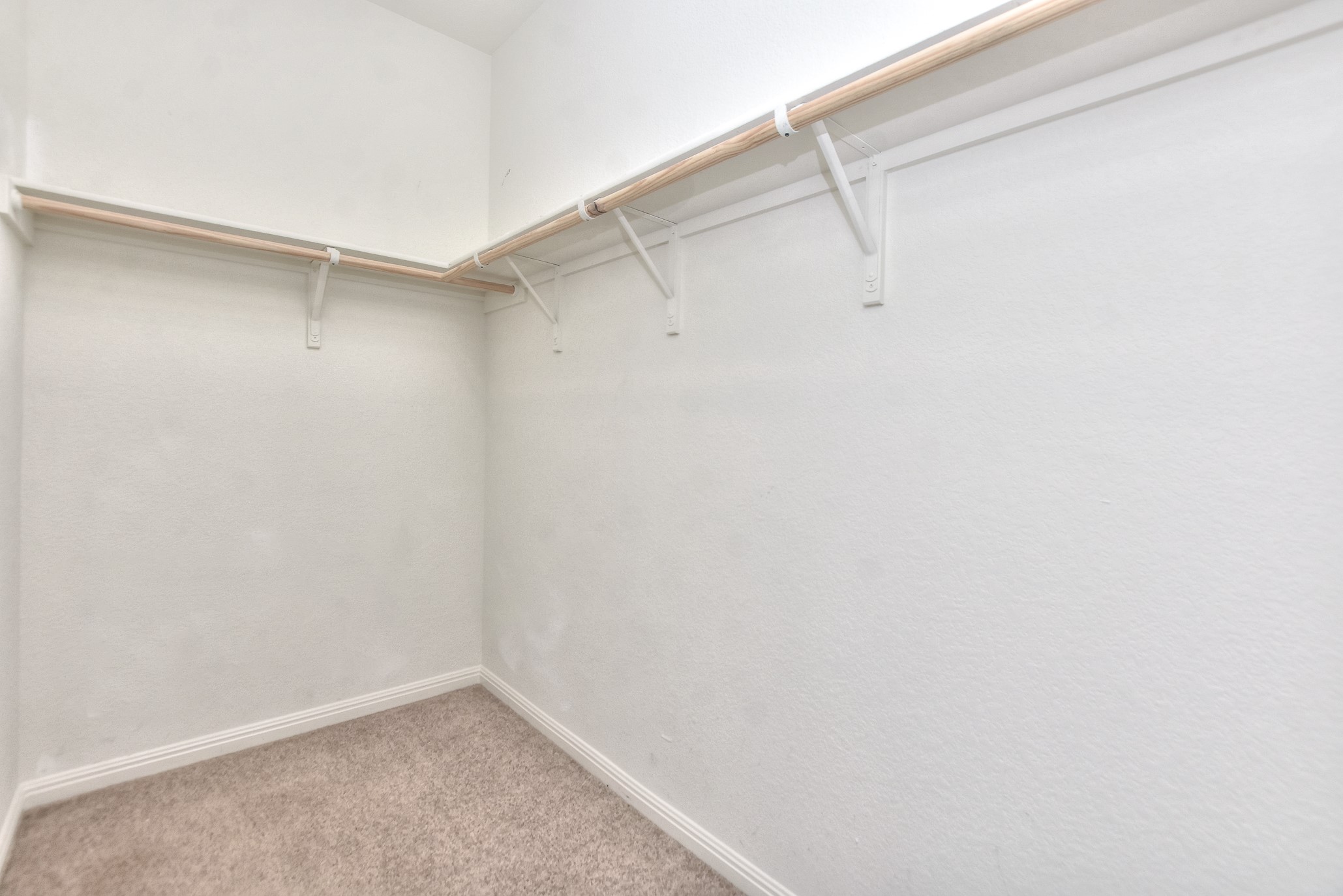 109 Helios Drive Jarrell, TX 76537 - Photo 14 of 29 a view of a room with racks on the wall