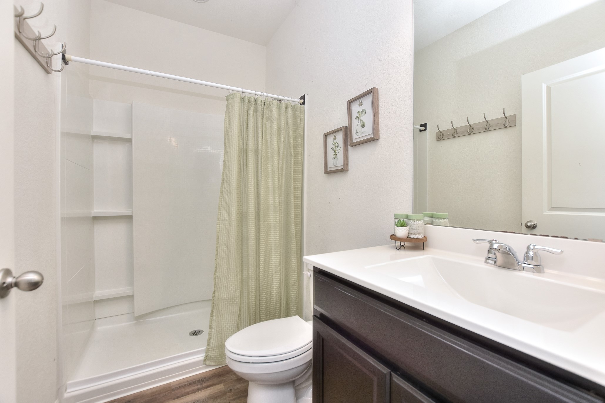 109 Helios Drive Jarrell, TX 76537 - Photo 16 of 32 a bathroom with a sink a toilet and shower
