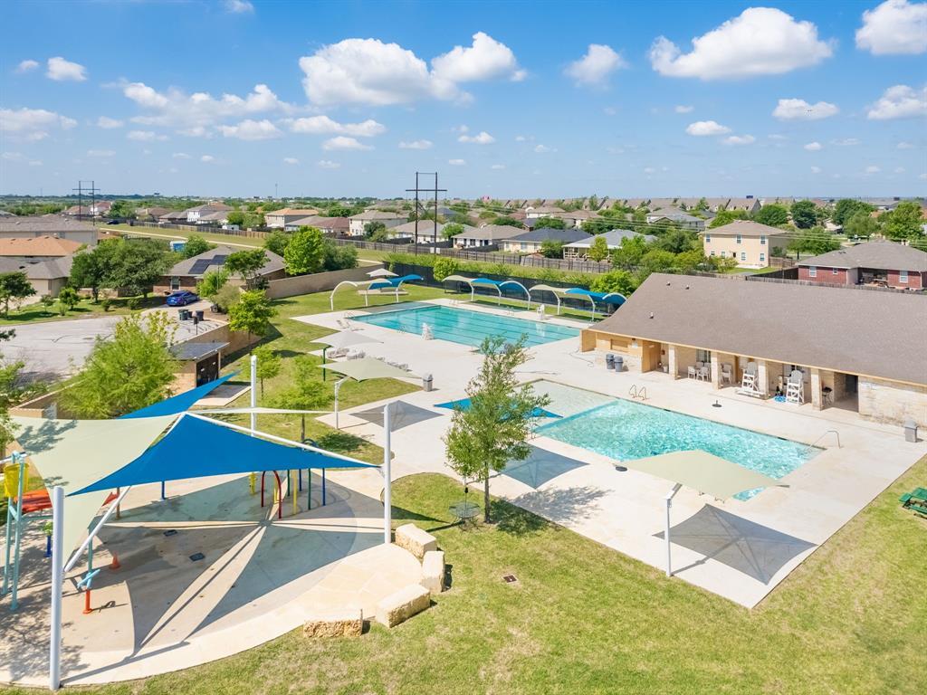 109 Helios Drive Jarrell, TX 76537 - Photo 27 of 29 an aerial view of residential houses with outdoor space