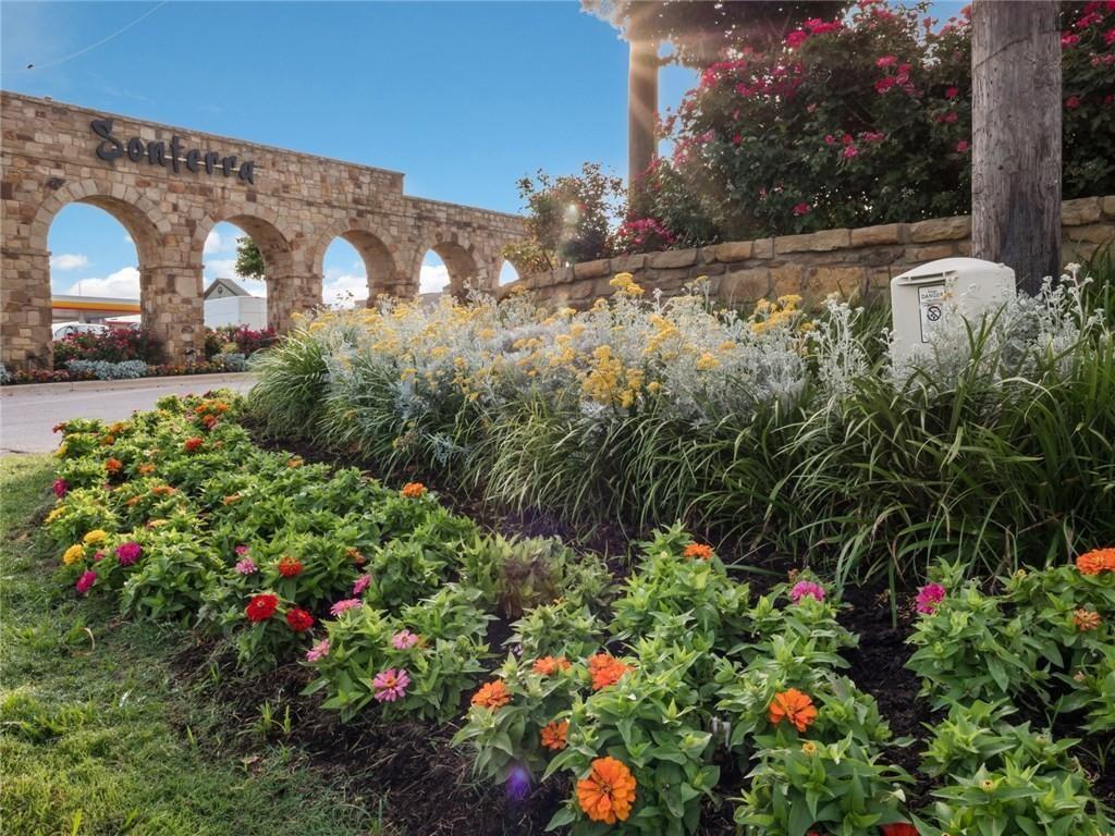 109 Helios Drive Jarrell, TX 76537 - Photo 28 of 32 a view of a garden with flowers