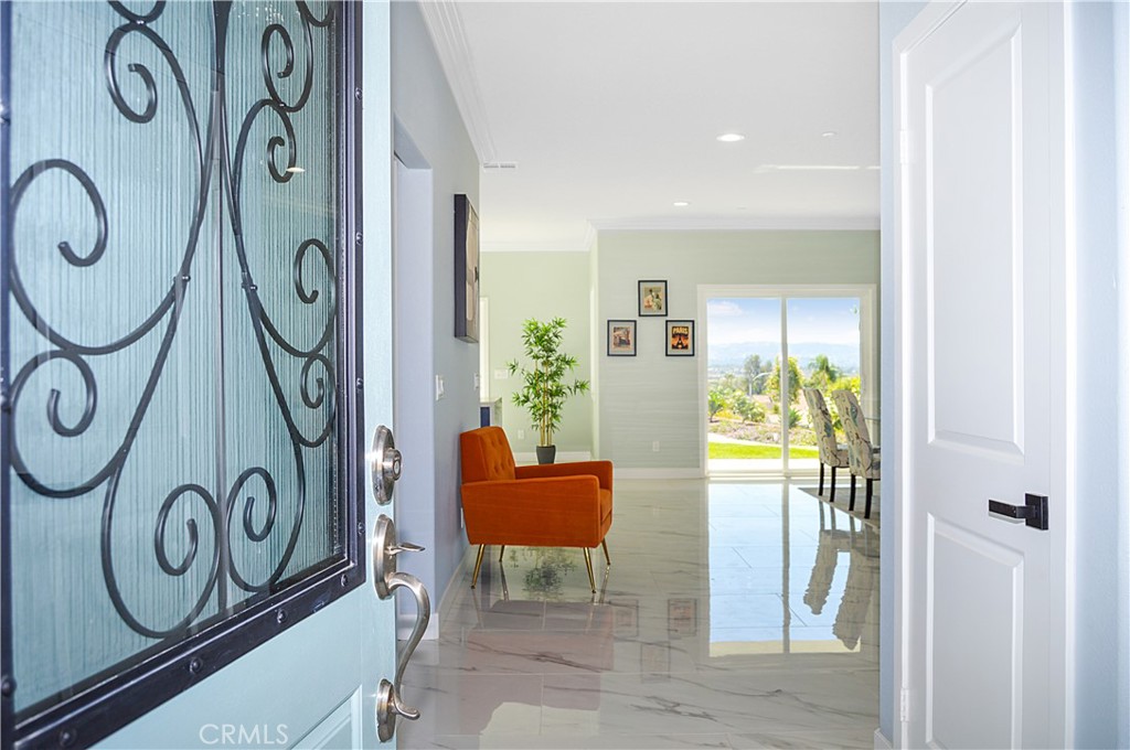 29329 Kemper Lane Highland, CA 92346 - Photo 10 of 75 a view of entryway with furniture and wooden floor