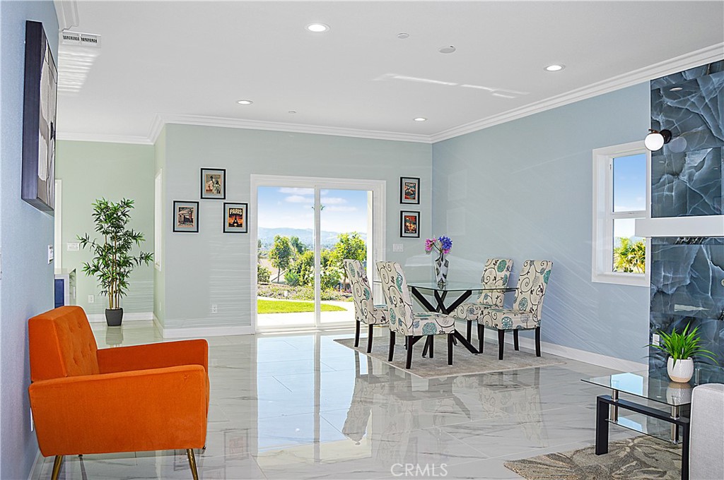 29329 Kemper Lane Highland, CA 92346 - Photo 12 of 75 a living room with furniture and a potted plant