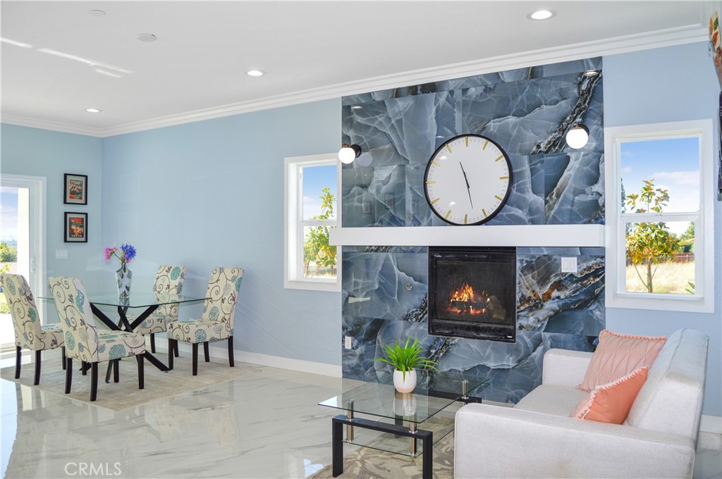 29329 Kemper Lane Highland, CA 92346 - Photo 14 of 75 a living room with furniture and a fireplace