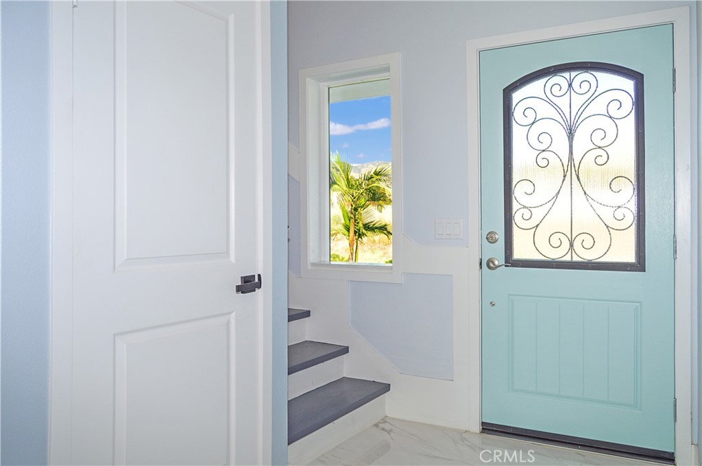 29329 Kemper Lane Highland, CA 92346 - Photo 28 of 75 Unit 1 - Closet Under Stairs by Entry