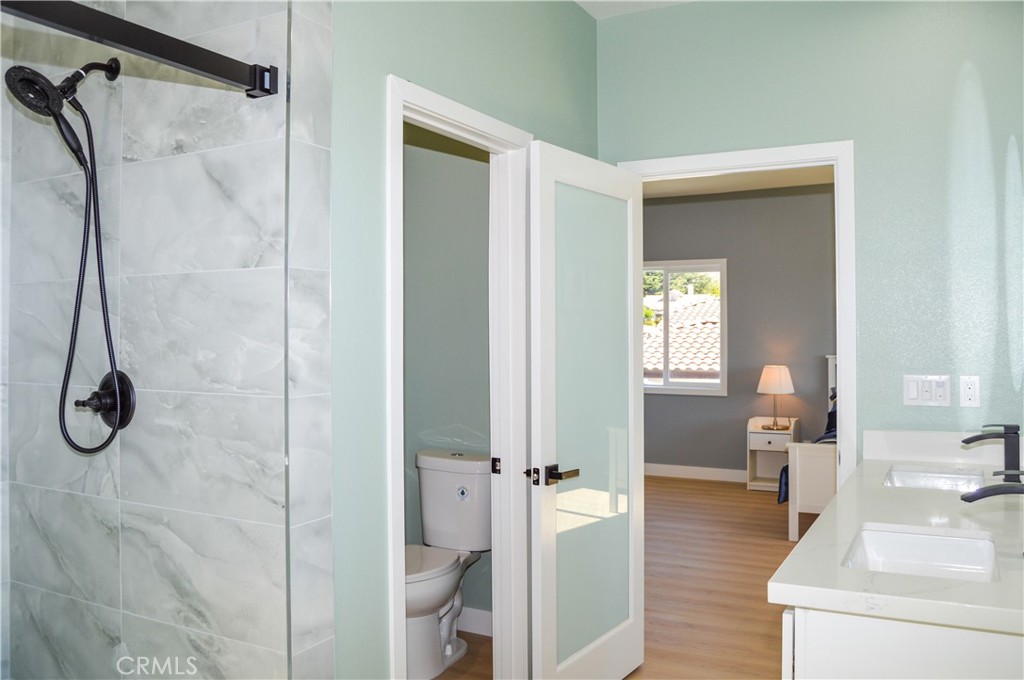 29329 Kemper Lane Highland, CA 92346 - Photo 37 of 75 a en suite bathroom with a sink and mirror
