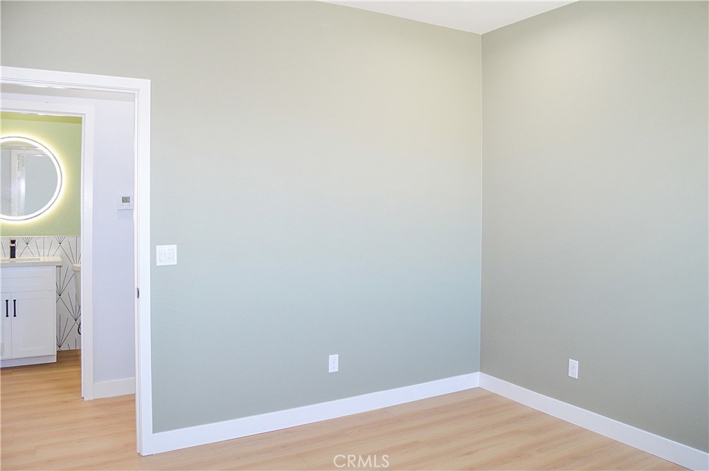 29329 Kemper Lane Highland, CA 92346 - Photo 41 of 75 a view of a hallway with wooden floor