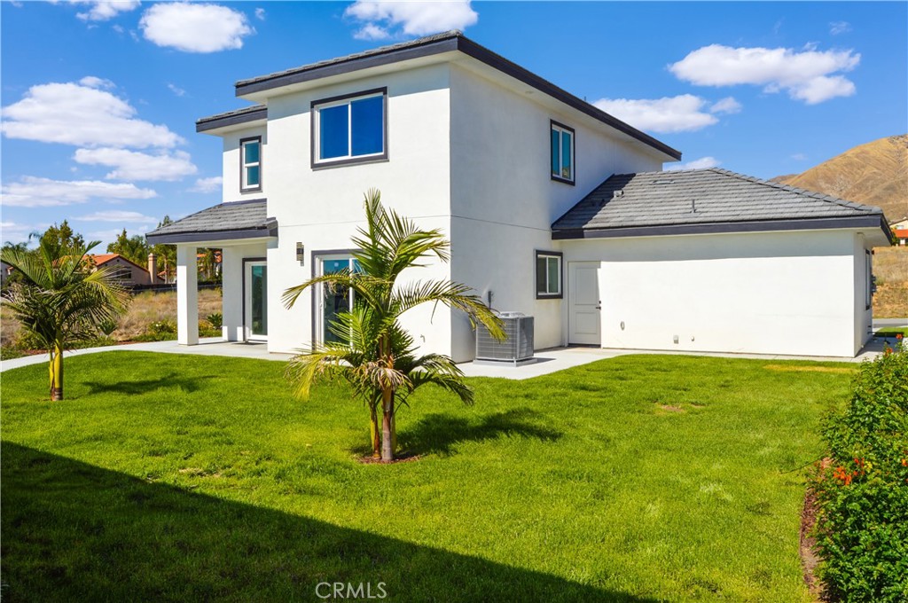 29329 Kemper Lane Highland, CA 92346 - Photo 48 of 75 a house view with a garden space