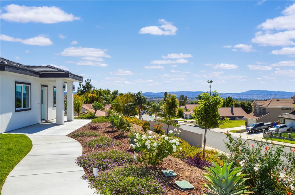 29329 Kemper Lane Highland, CA 92346 - Photo 52 of 75 a view of a house with a yard and potted plants