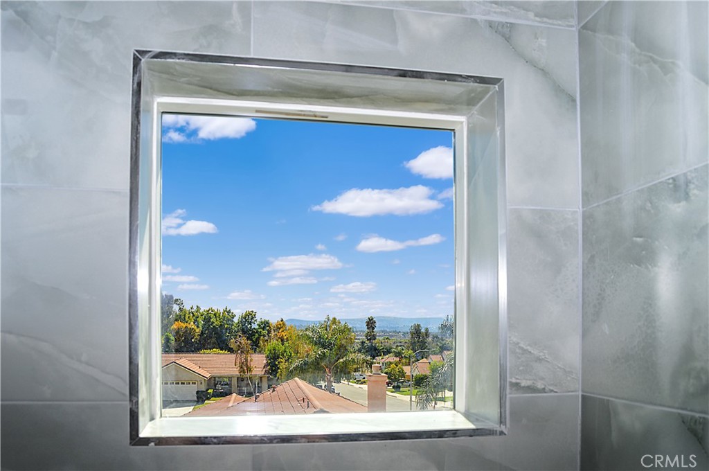 29329 Kemper Lane Highland, CA 92346 - Photo 67 of 75 Unit 2 - Main Suite Bath with glass-enclosed shower, lighted mirror and even a view from the shower
