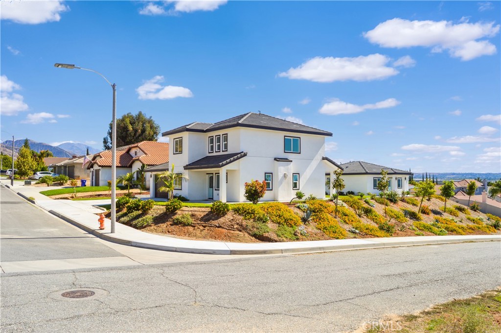 29329 Kemper Lane Highland, CA 92346 - Photo 74 of 75 a front view of a house with a yard