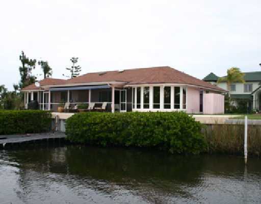 706 Irwin Lane Jupiter, FL 33458 - Photo 16 of 16 a front view of a house with a yard