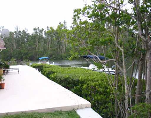 706 Irwin Lane Jupiter, FL 33458 - Photo 6 of 16 a view of backyard with green space