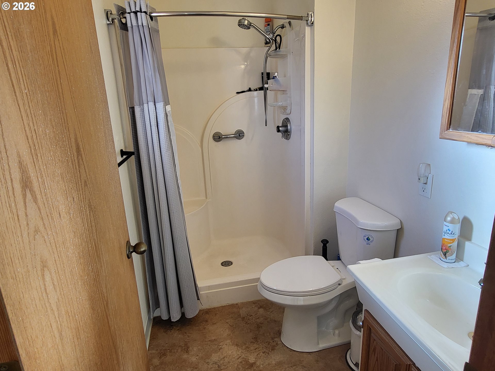 963 Crocker Street Coos Bay, OR 97420 - Photo 21 of 42 a bathroom with a toilet and a shower