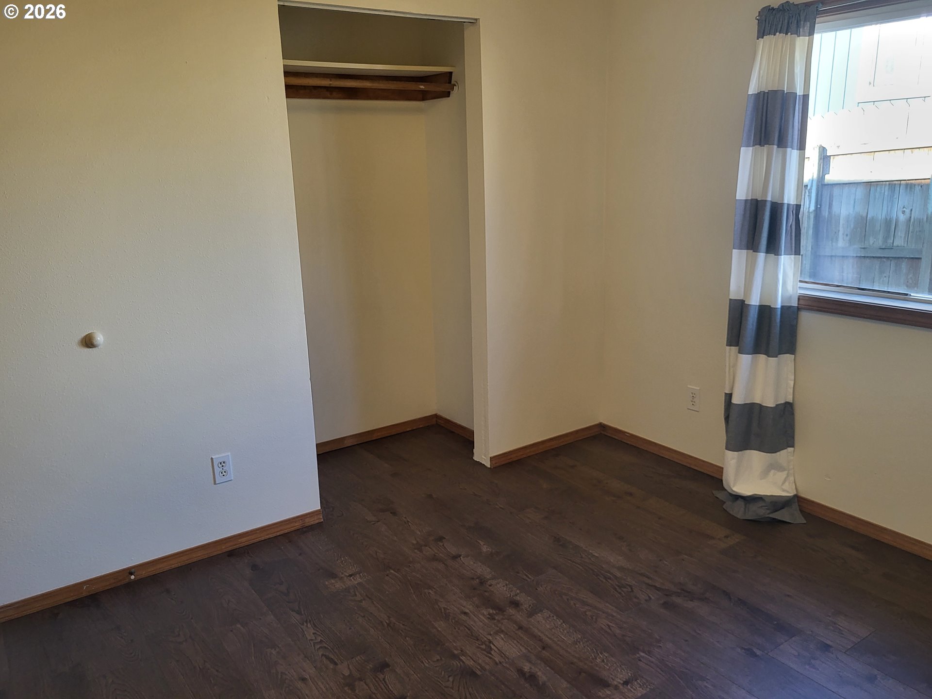 963 Crocker Street Coos Bay, OR 97420 - Photo 25 of 42 a view of empty room with wooden floor