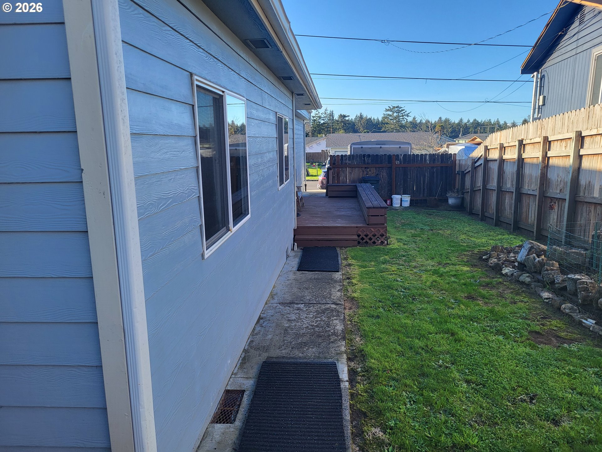 963 Crocker Street Coos Bay, OR 97420 - Photo 41 of 42 a view of a back yard from a balcony