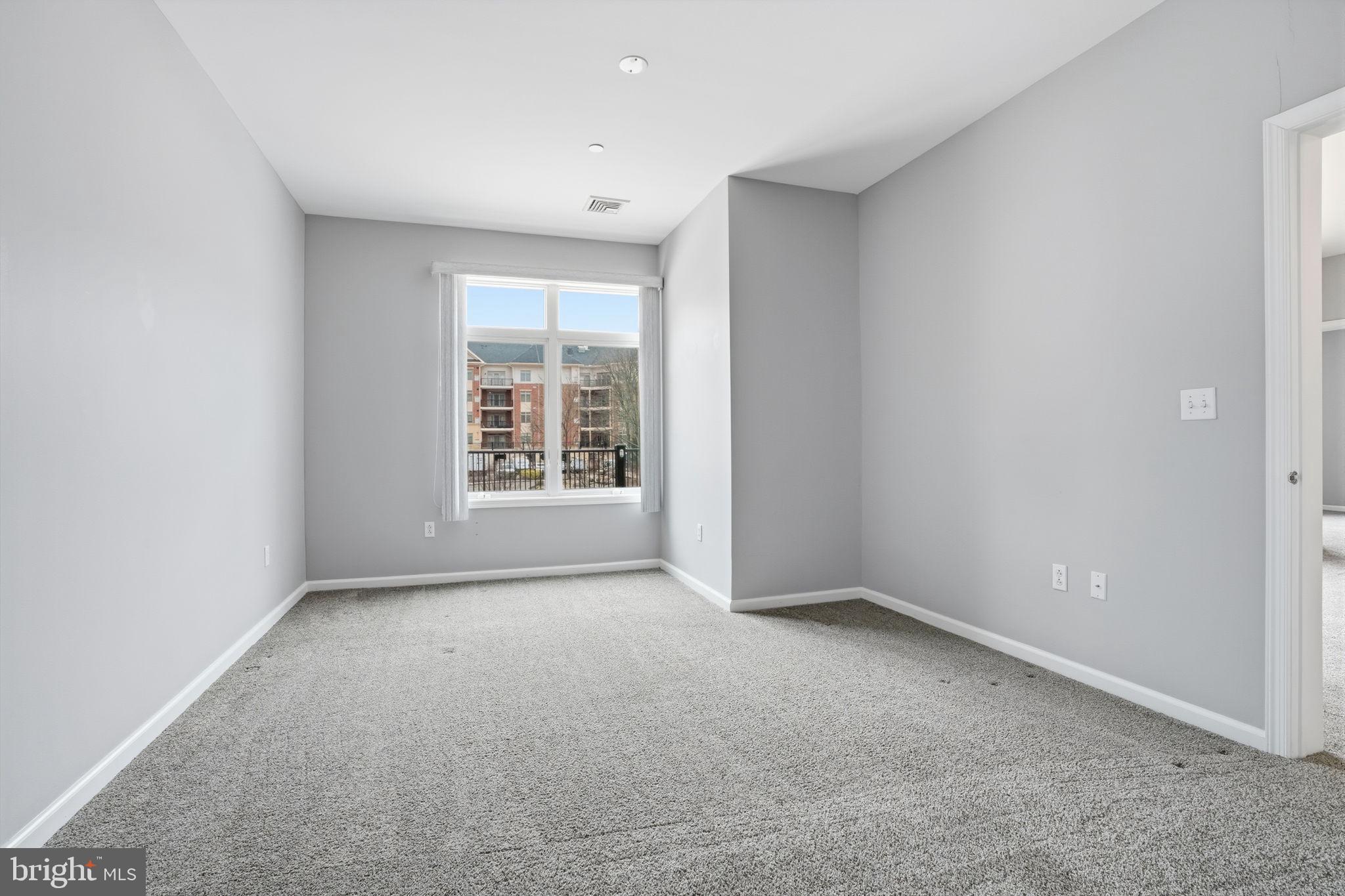 235 Carson Terrace Huntingdon Valley, PA 19006 - Photo 13 of 23 an empty room with windows