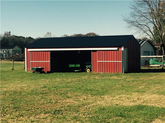 1230 Northwest Rutland Road Mount Juliet, TN 37122 - Photo 17 of 20 3 stall metal barn with extra wide 20' doorway.