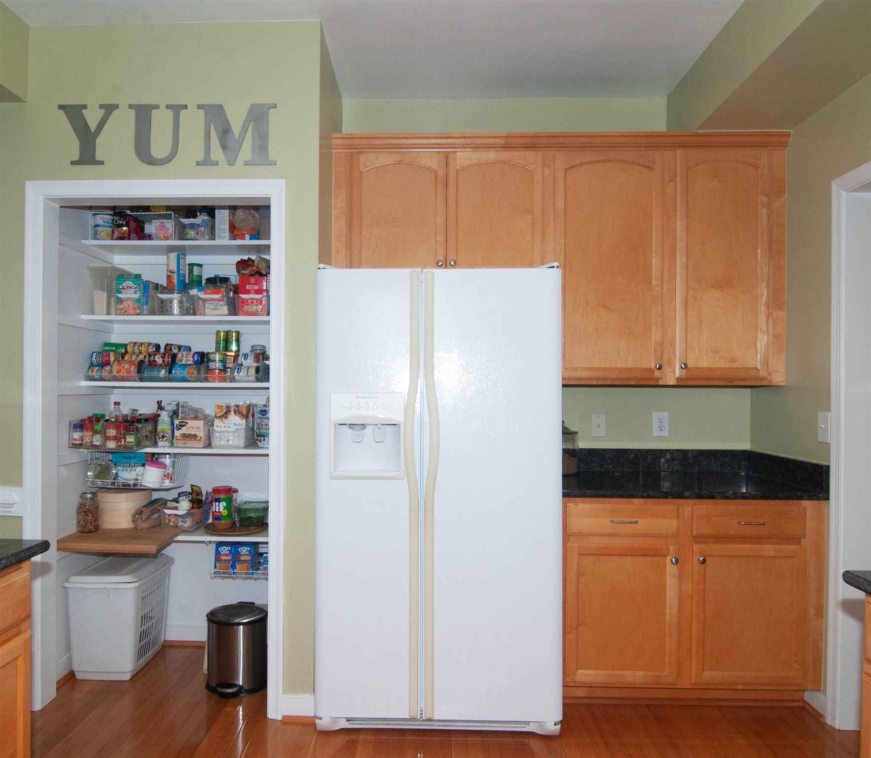 1265 Amber Ridge Road Charlottesville, VA 22901 - Photo 13 of 44 a kitchen with a refrigerator and cabinets