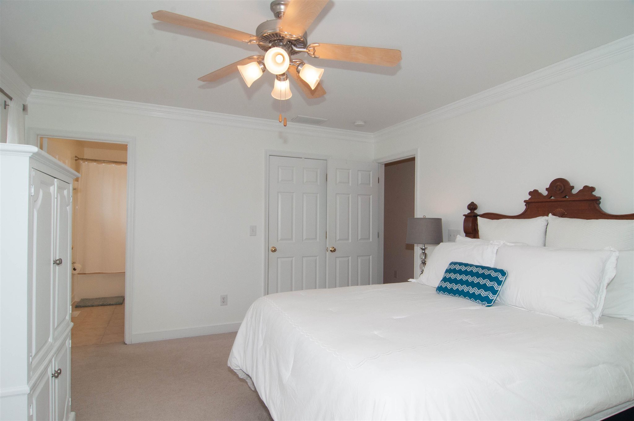 1265 Amber Ridge Road Charlottesville, VA 22901 - Photo 21 of 44 a bedroom with a bed and a chandelier