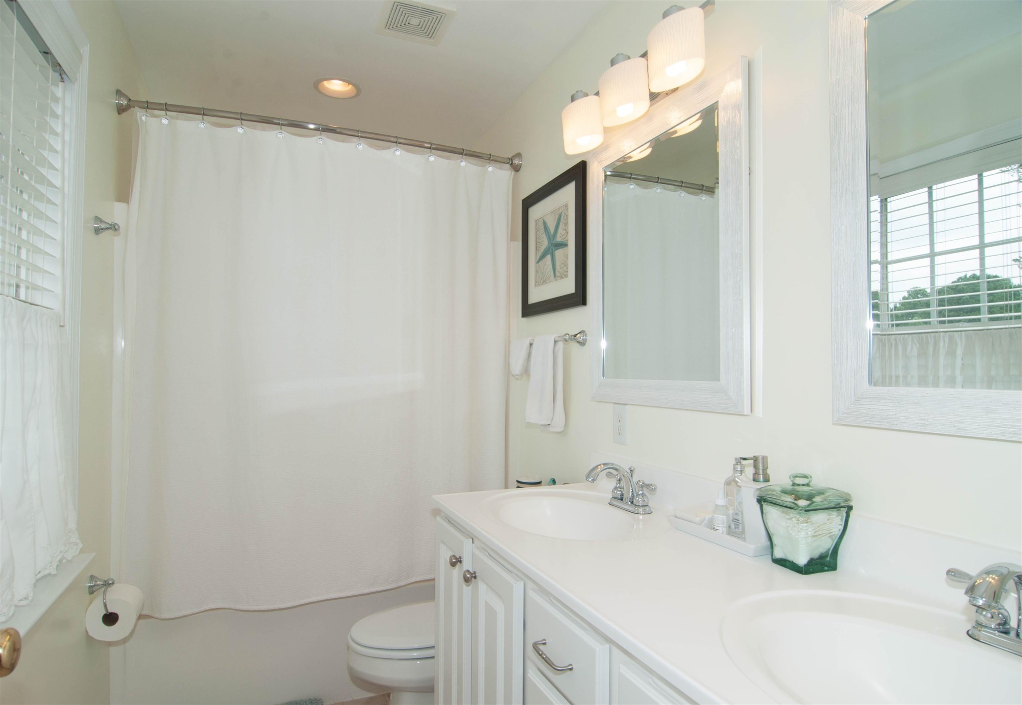 1265 Amber Ridge Road Charlottesville, VA 22901 - Photo 22 of 44 a bathroom with a sink a toilet and mirror