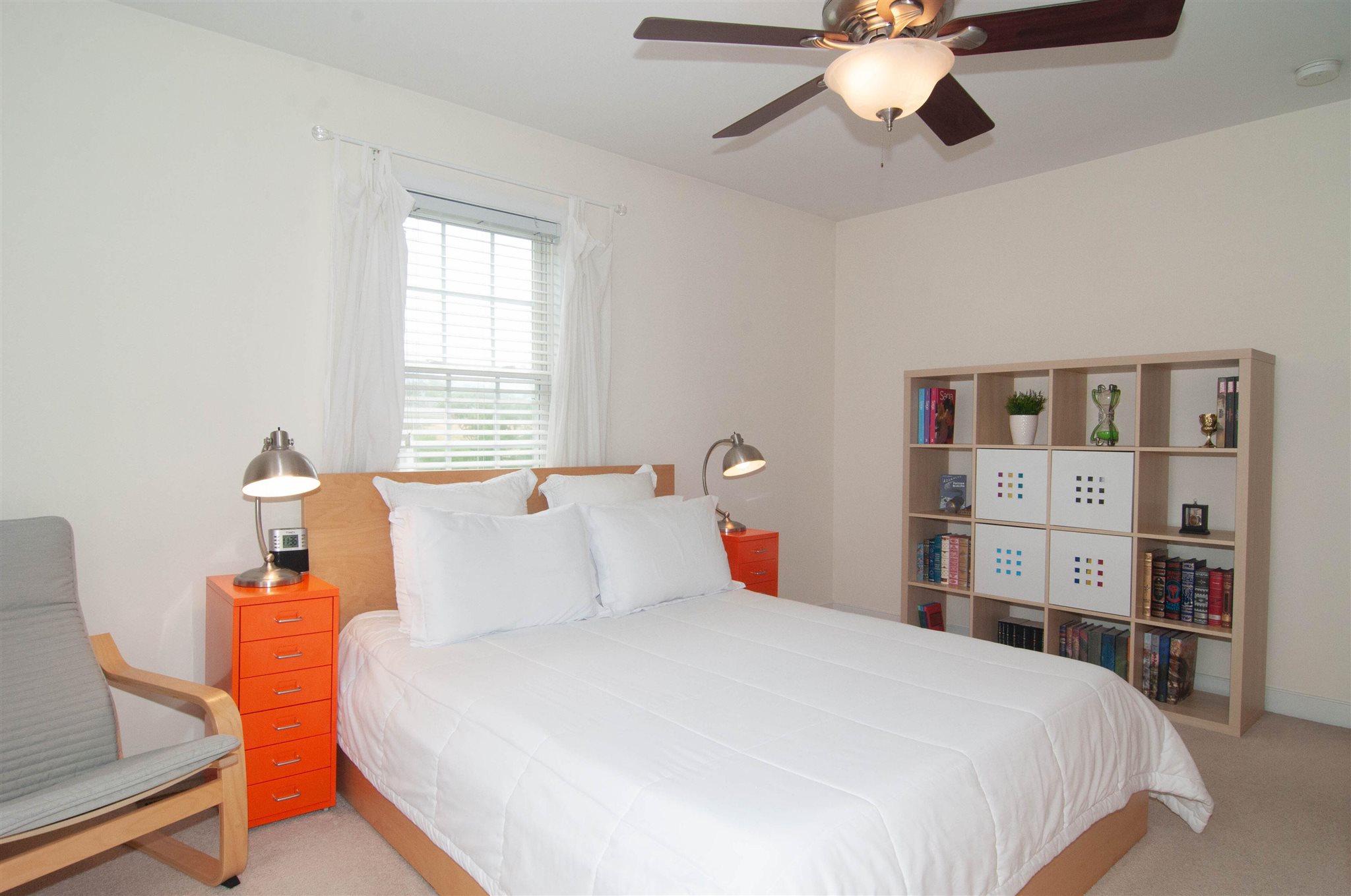 1265 Amber Ridge Road Charlottesville, VA 22901 - Photo 25 of 44 a bedroom with a bed and a chandelier