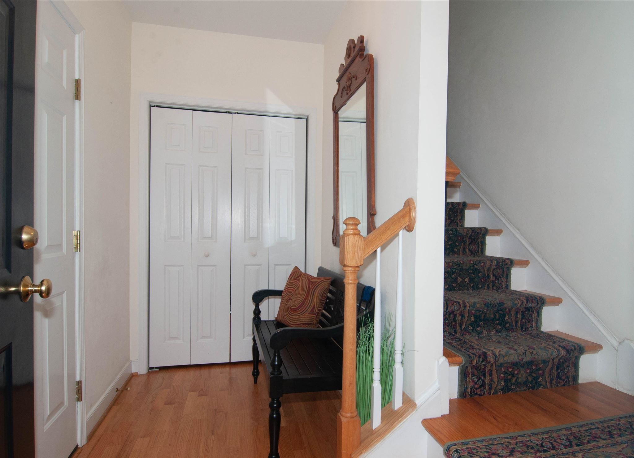 1265 Amber Ridge Road Charlottesville, VA 22901 - Photo 3 of 44 a view of hallway with stairs and wooden floor