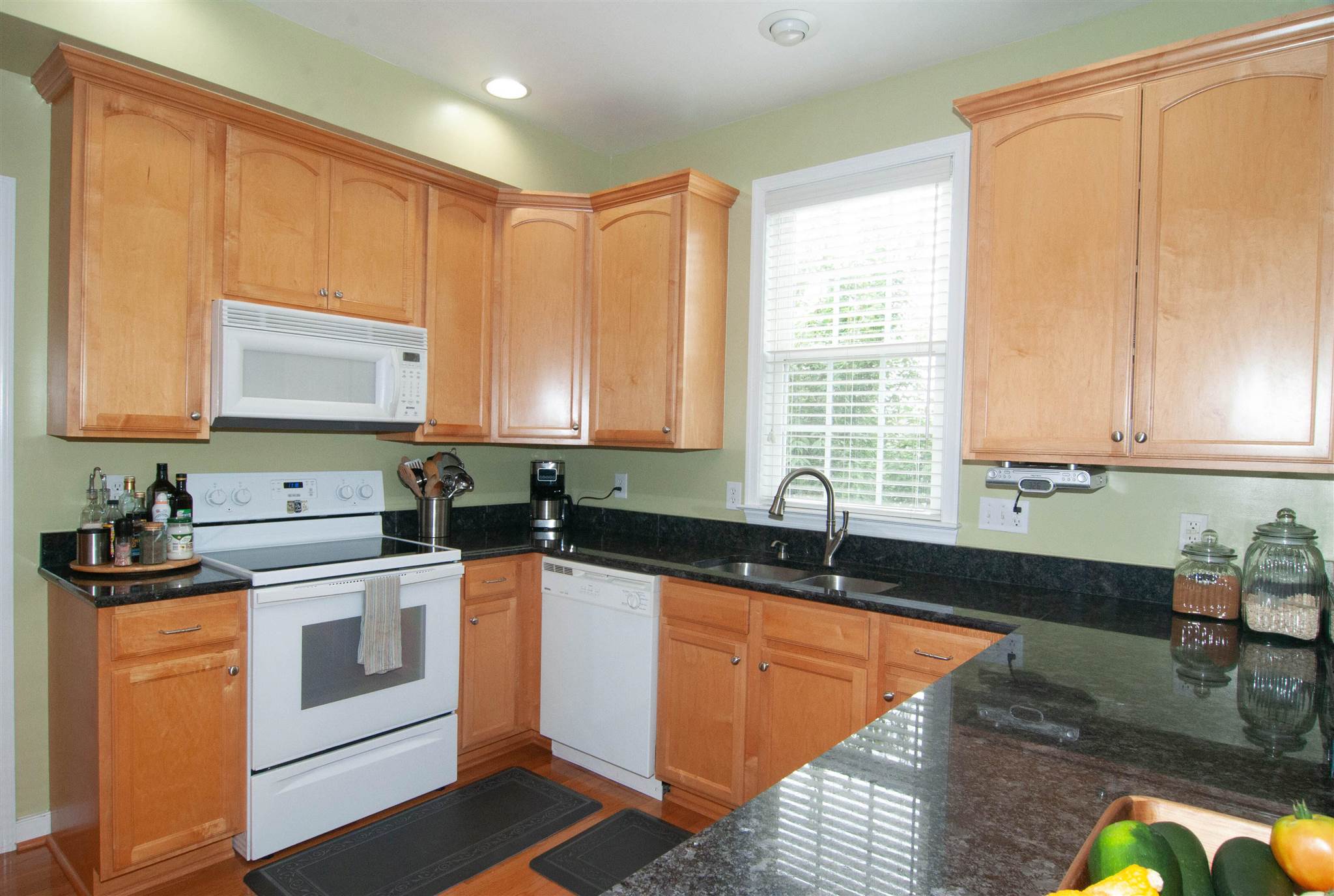 1265 Amber Ridge Road Charlottesville, VA 22901 - Photo 9 of 44 a kitchen with stainless steel appliances granite countertop a sink a stove and cabinets