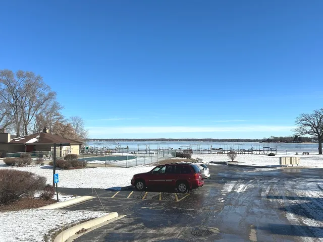 a view of a swimming pool with a yard