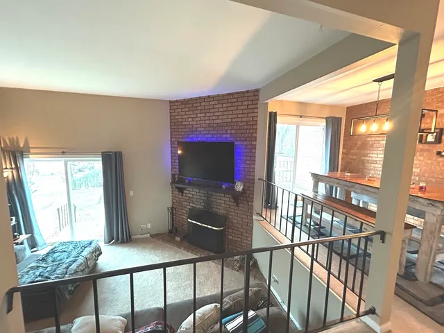 a livingroom with furniture window and wooden floor