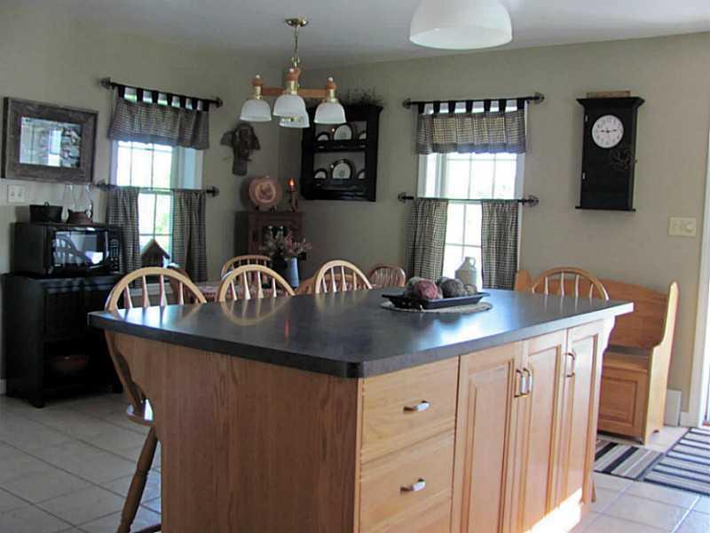 596 New Canada Road Fort Kent, ME 04743 - Photo 28 of 35 Kitchen. Kitchen island