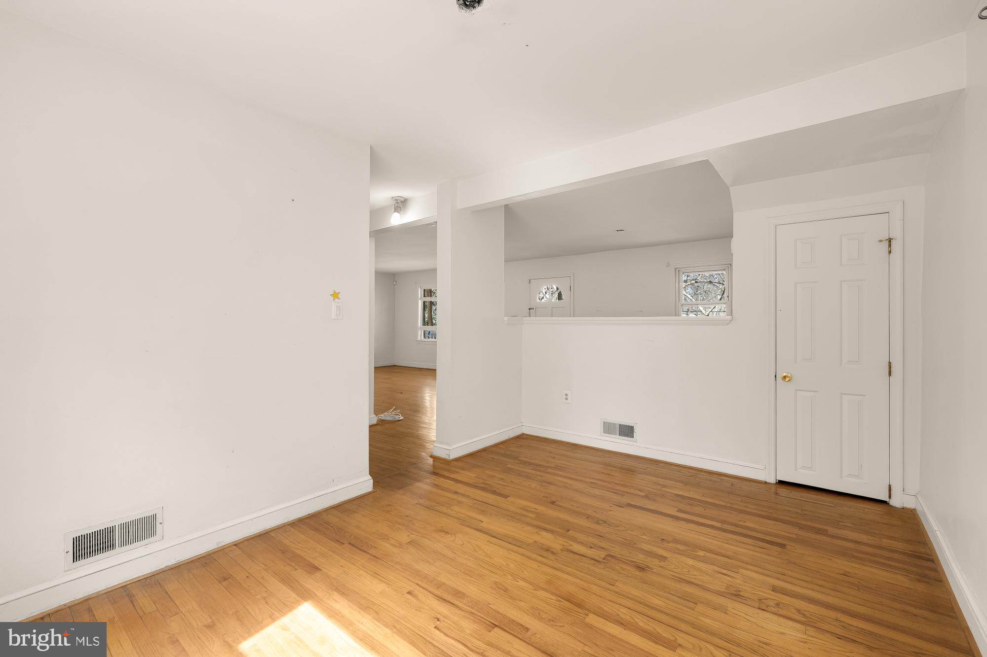 6112 Madawaska Road Bethesda, MD 20816 - Photo 13 of 56 a view of empty room with wooden floor