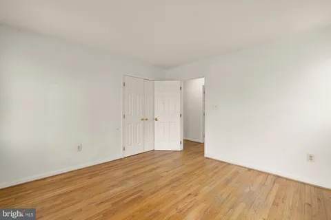 a bathroom with a sink toilet and mirror