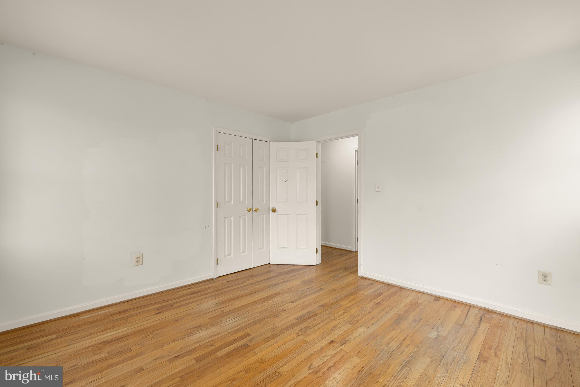 6112 Madawaska Road Bethesda, MD 20816 - Photo 27 of 56 a view of empty room with wooden floor