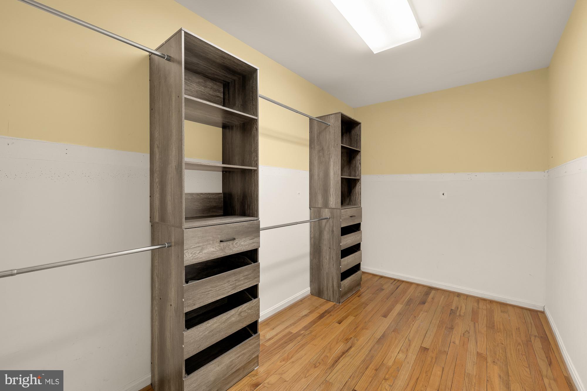 6112 Madawaska Road Bethesda, MD 20816 - Photo 28 of 56 a view of walk in closet with empty racks