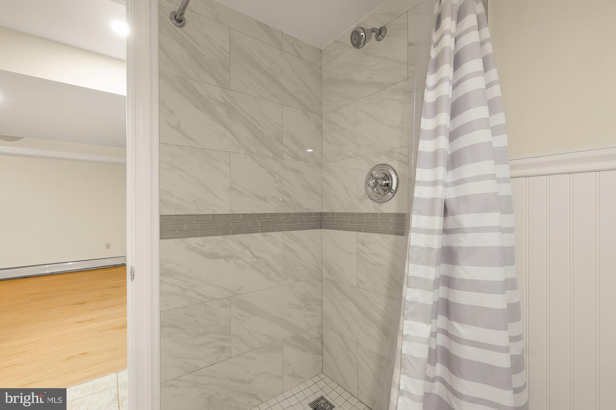 6112 Madawaska Road Bethesda, MD 20816 - Photo 41 of 56 a bathroom with a shower