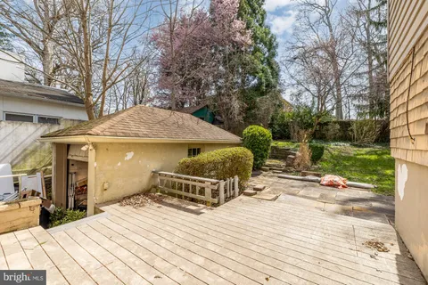 a view of outdoor space with trees all around