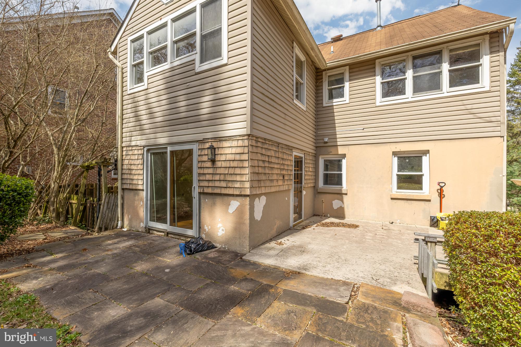 6112 Madawaska Road Bethesda, MD 20816 - Photo 49 of 56 a view of a house with a patio