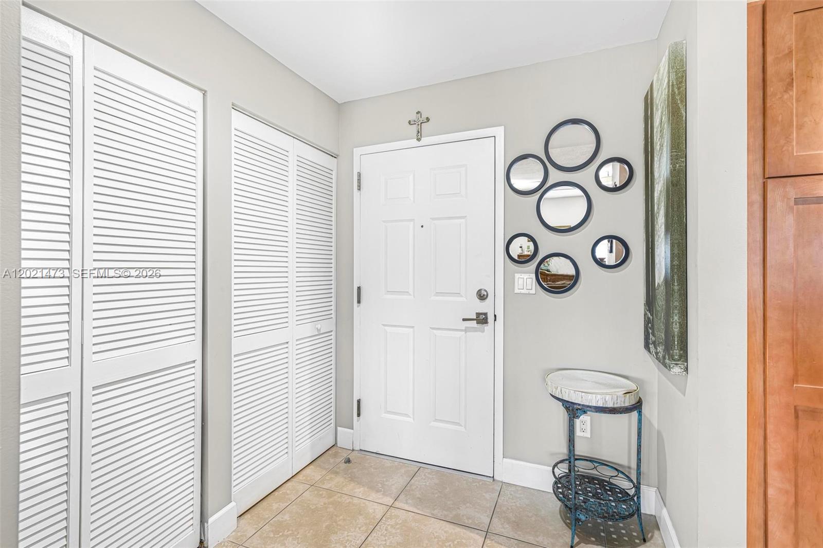 8395 Southwest 73rd Avenue, Unit 710 Miami, FL 33143 - Photo 6 of 32 a bathroom with a shower and a sink
