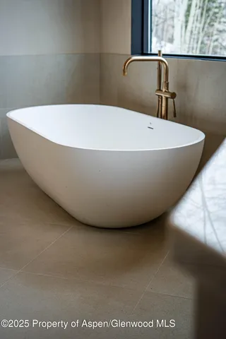 a view of a bathtub in a bathroom