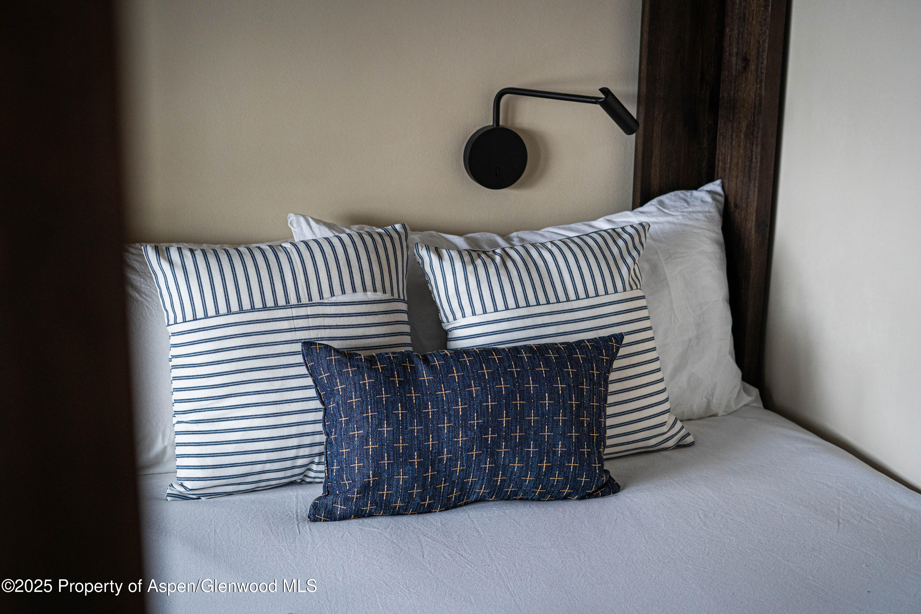 306 Edgewood Lane Snowmass Village, CO 81615 - Photo 25 of 41 a view of a brick wall with windows