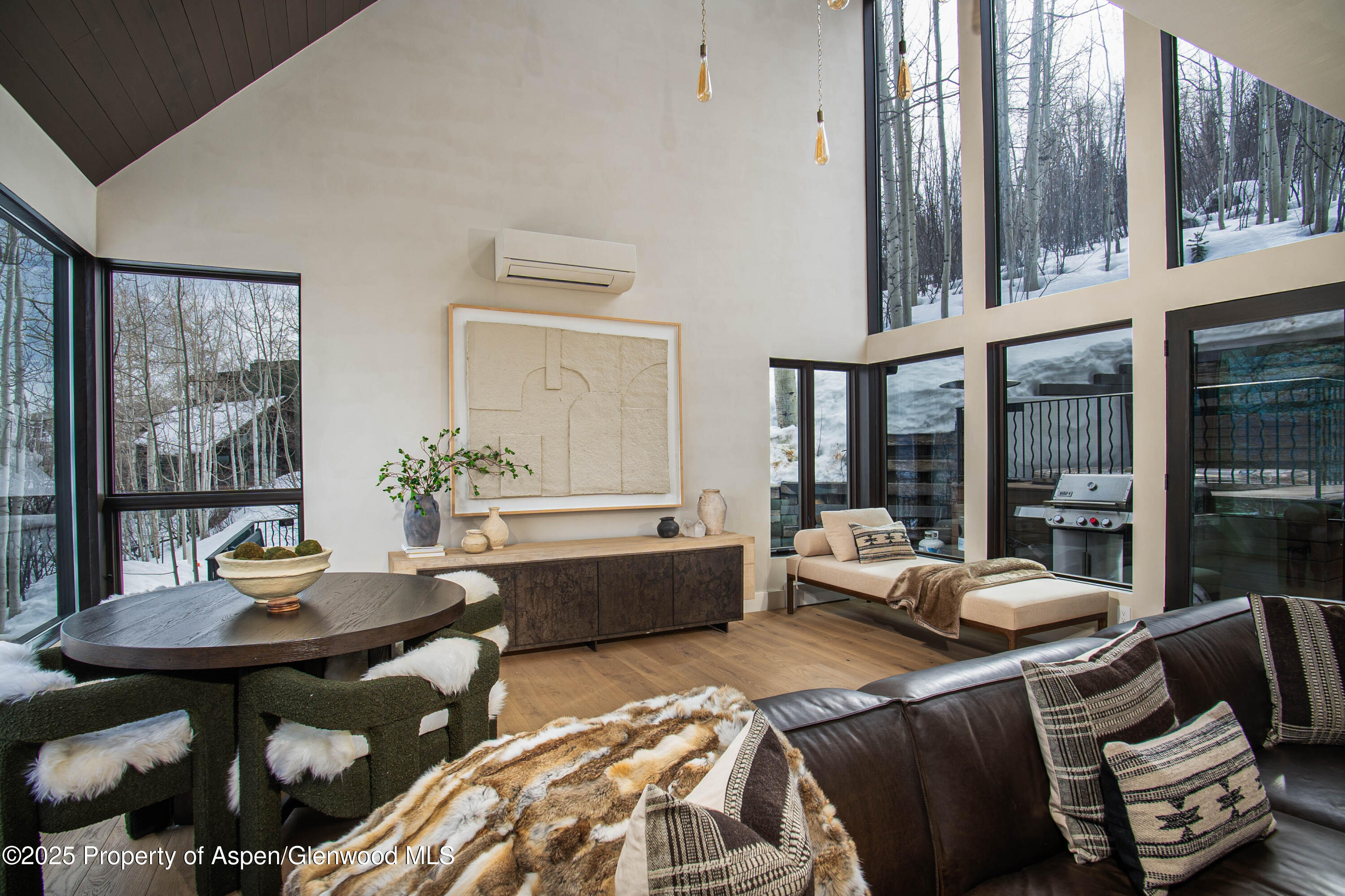 306 Edgewood Lane Snowmass Village, CO 81615 - Photo 3 of 41 a living room with furniture and large windows