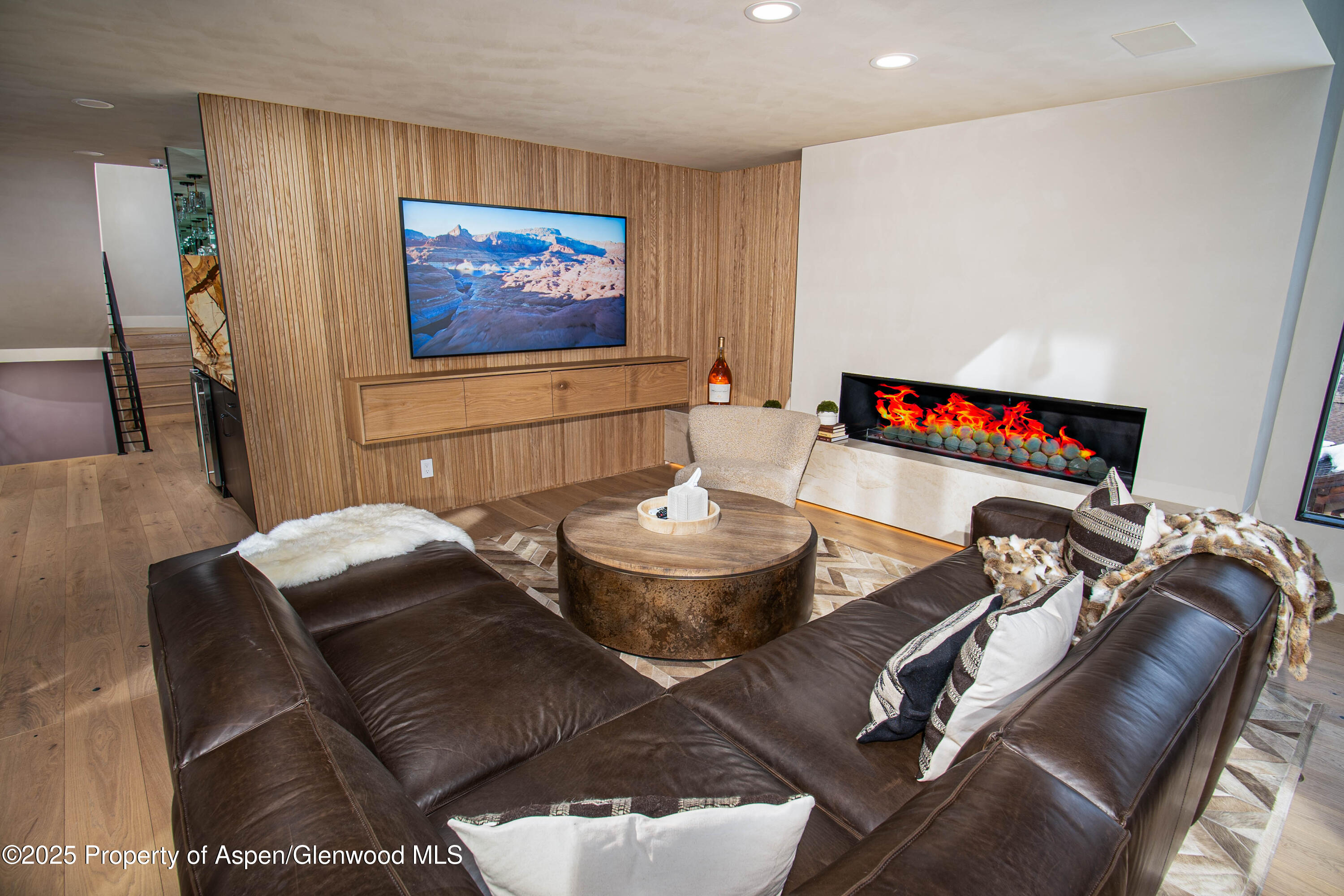 306 Edgewood Lane Snowmass Village, CO 81615 - Photo 32 of 41 a living room with furniture and a flat screen tv