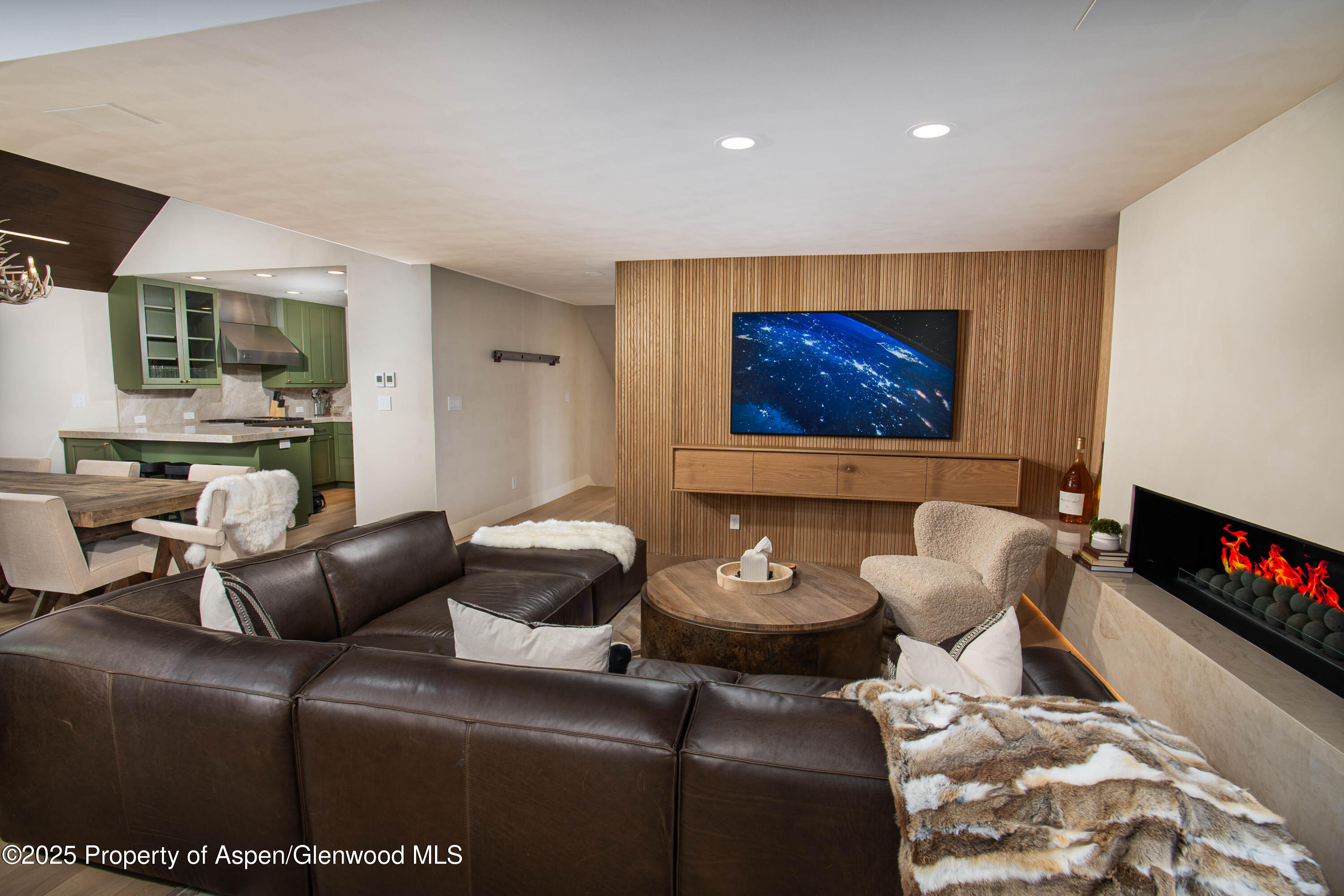 306 Edgewood Lane Snowmass Village, CO 81615 - Photo 33 of 41 a living room with furniture and a flat screen tv